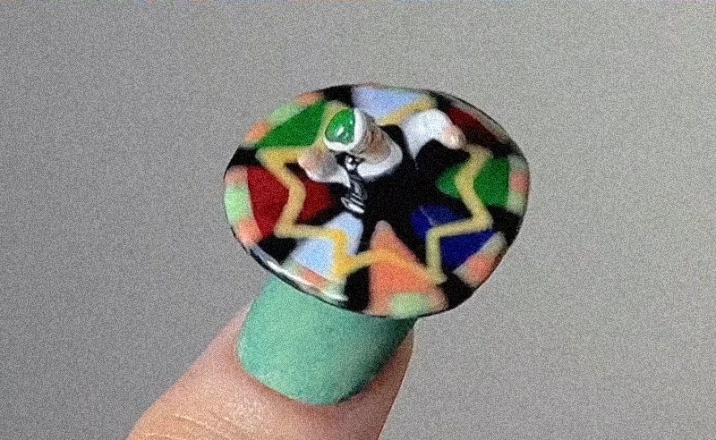 This Egyptian Nail Artist Put a Spinning Tanoura Man on Her Nails
